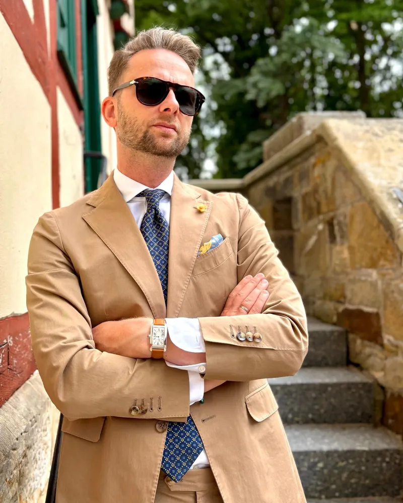 Cartier Tank Américaine with beige suit